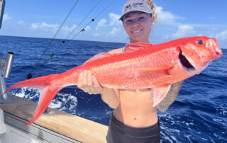 Girl with Queen Snapper